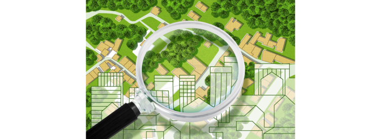 Bild vergrößern: Real Estate concept with an imaginary cadastral map of territory with cityscape, buildings, roads and land parcel - Concept image seen through a magnifying glass